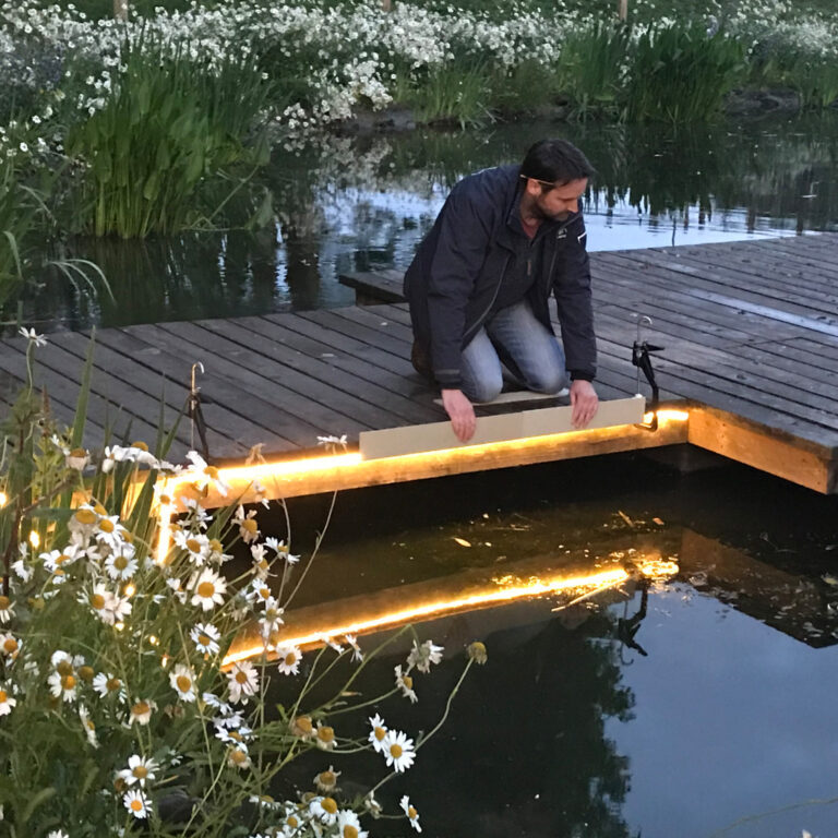 Lighting a floating pontoon on a lake